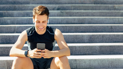 man texting on phone